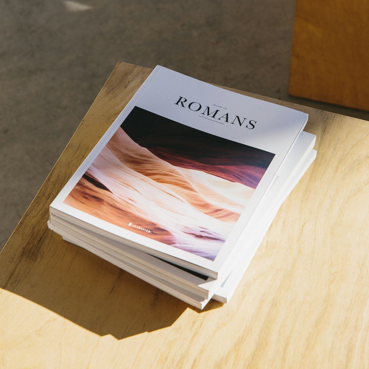 Stack of printed booklets and catalogs